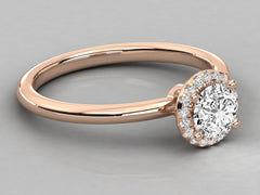 14K GOLD SOLITAIRE ROUND DIAMOND LADIES RING.