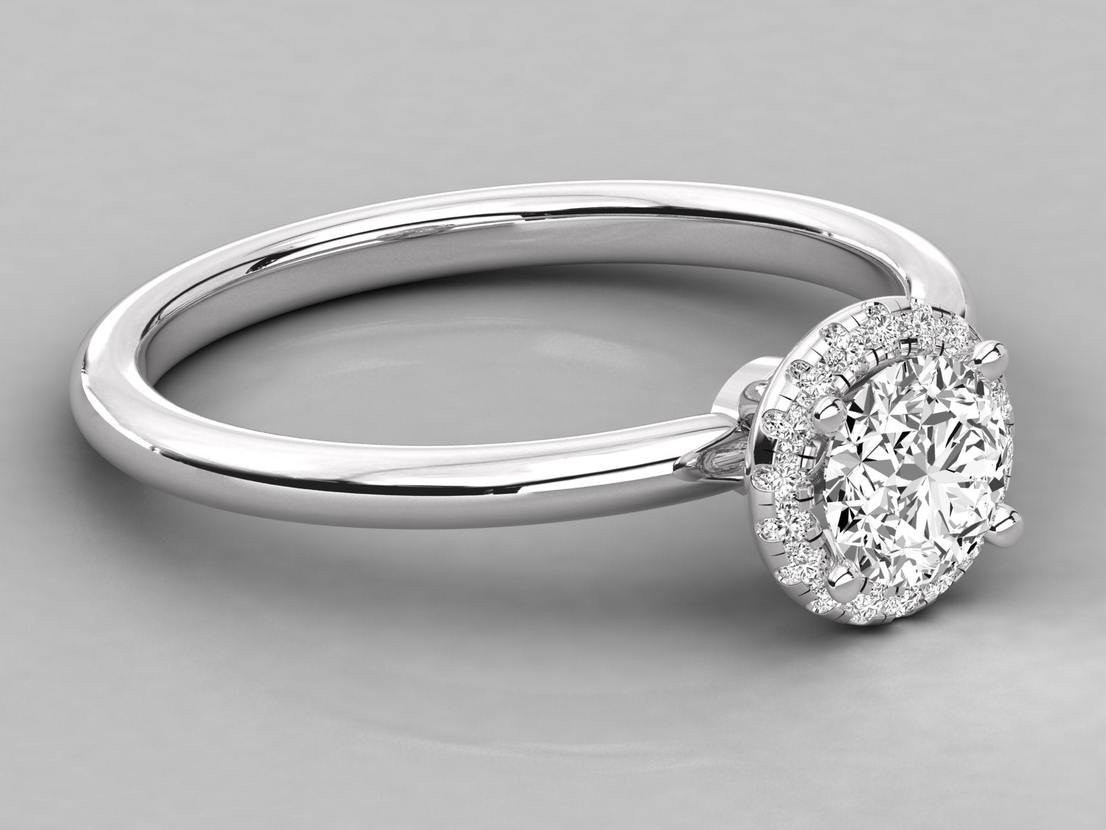 9K GOLD SOLITAIRE ROUND DIAMOND LADIES BRILLIANT RING.