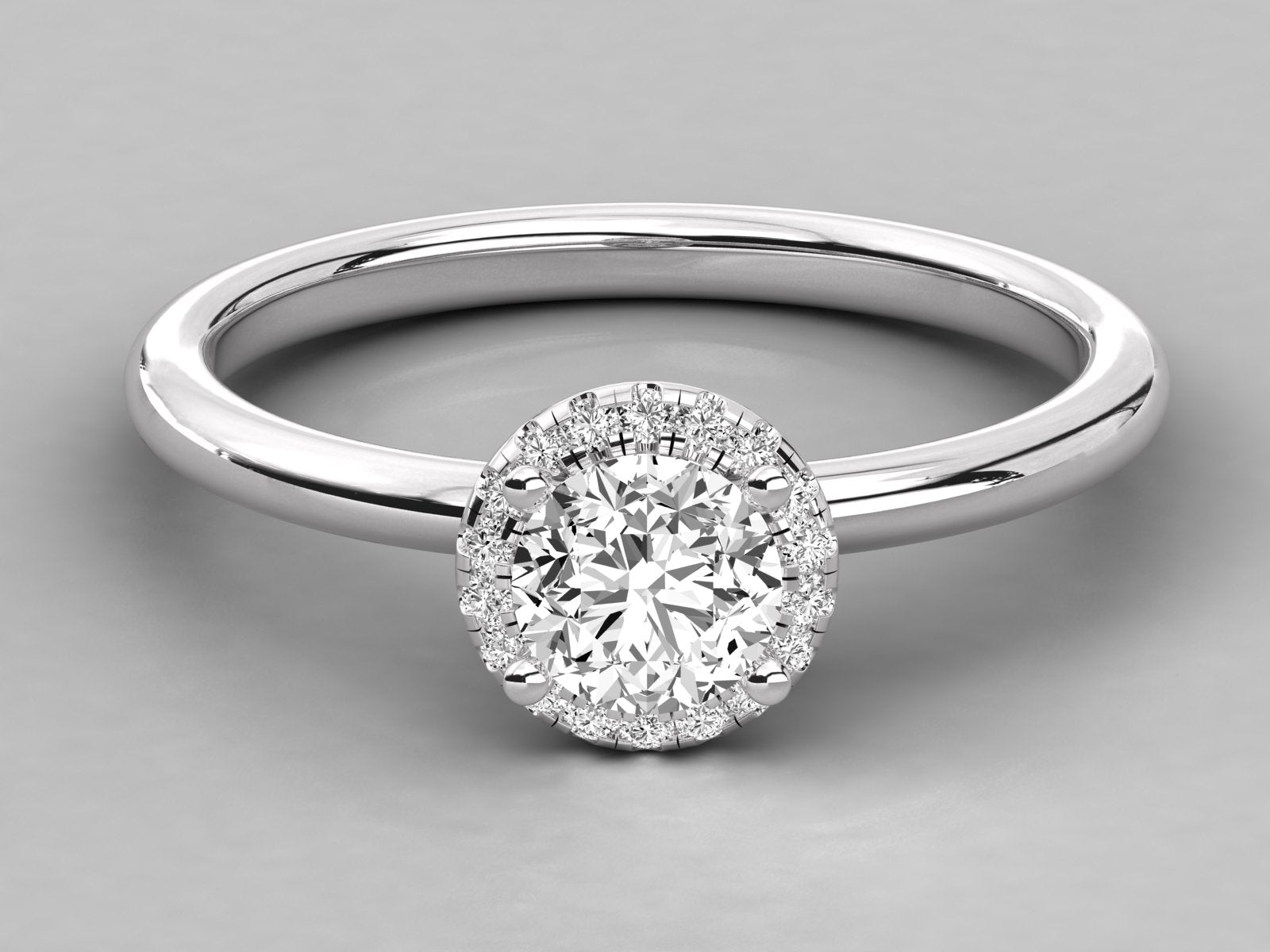 9K GOLD SOLITAIRE ROUND DIAMOND LADIES BRILLIANT RING.